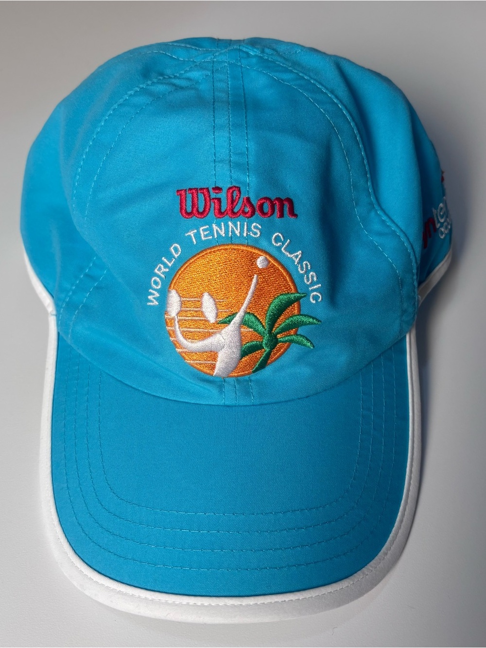 Vintage Wilson Tennis Cap in Electric Blue with Orange Logo